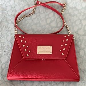 Bebe red pebble leather clutch